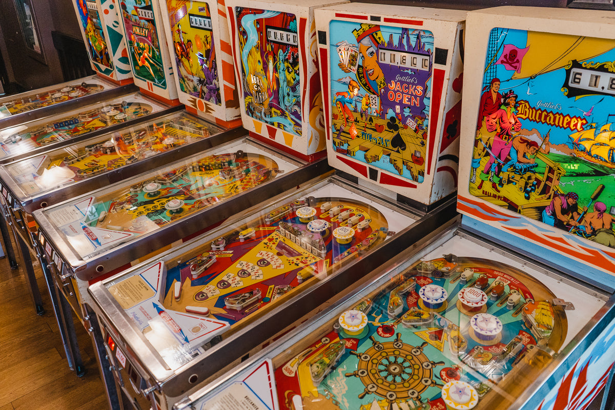 Vintage pinball machines in the Upper Deck